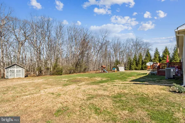 a view of a yard with an trees