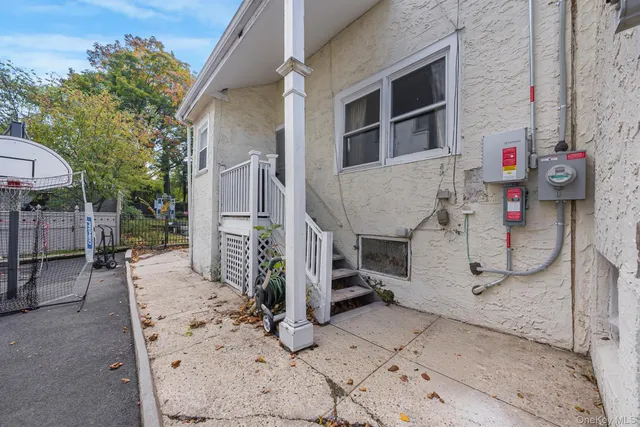 a view of a wooden deck with a large window