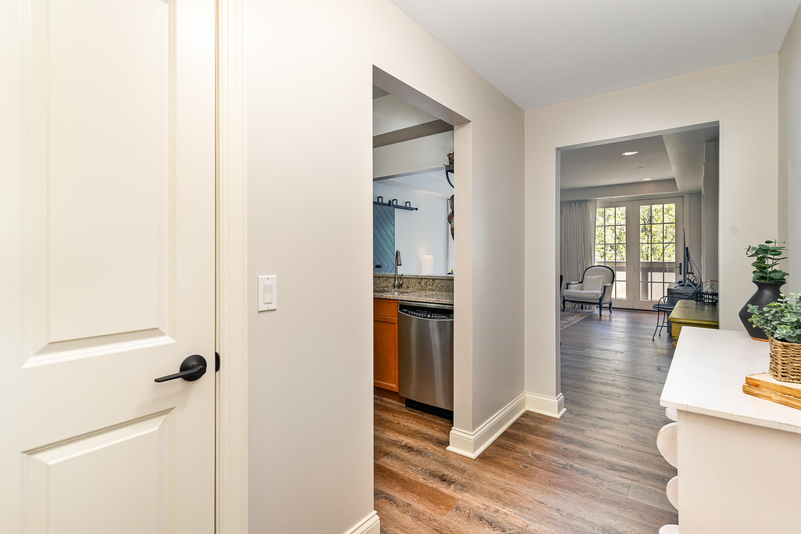 720 Green Bay Road, Unit 2E Winnetka, IL 60093 - Photo 12 of 15 a view of a hallway view with wooden floor and dining room