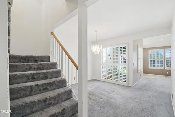 a view of entryway with stairs