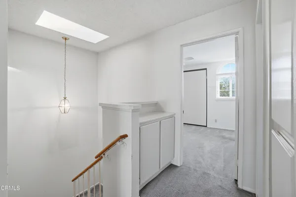 a bathroom with a sink and vanity