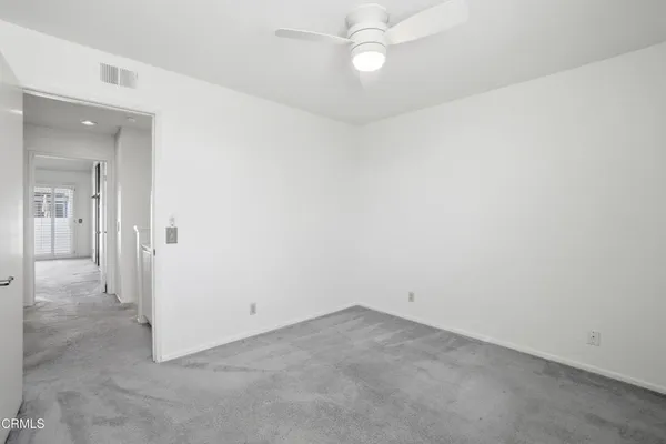 a view of a storage & utility room with closet