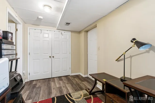 a view of a workspace with furniture