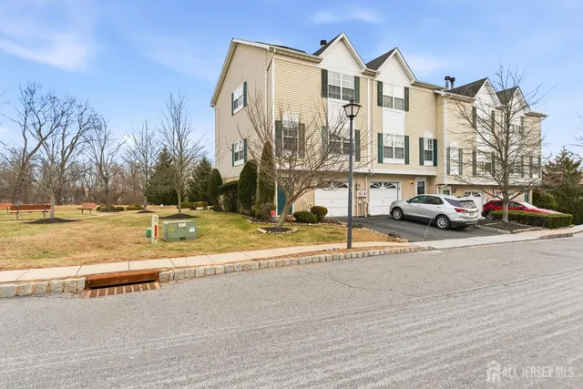 an aerial view of a house with a garden