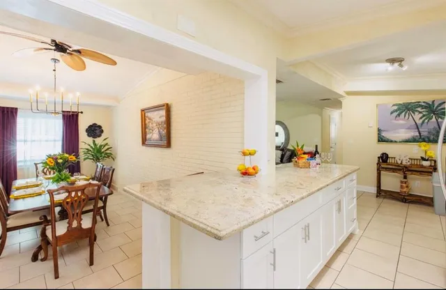a view of a kitchen with appliances and cabinets