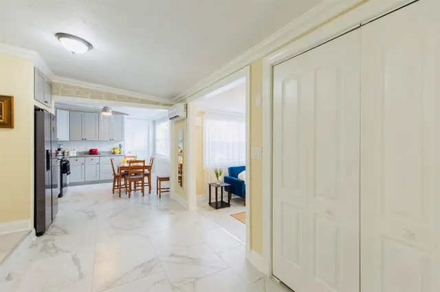 a kitchen with stainless steel appliances granite countertop a sink and cabinets