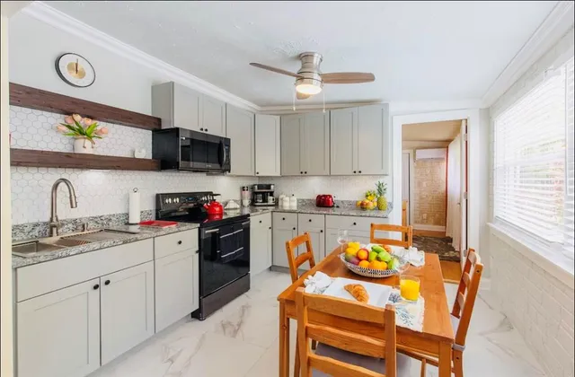 a view of living room with furniture and flat screen tv