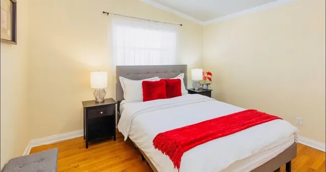 a bed room with a bed and a couch