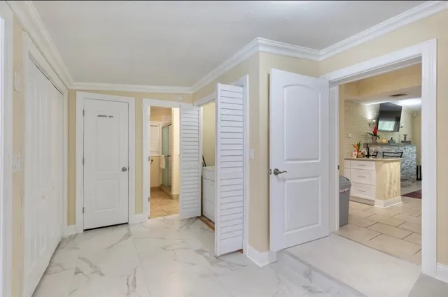 a backyard of a house with outdoor seating