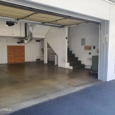a view of a refrigerator in kitchen and a refrigerator