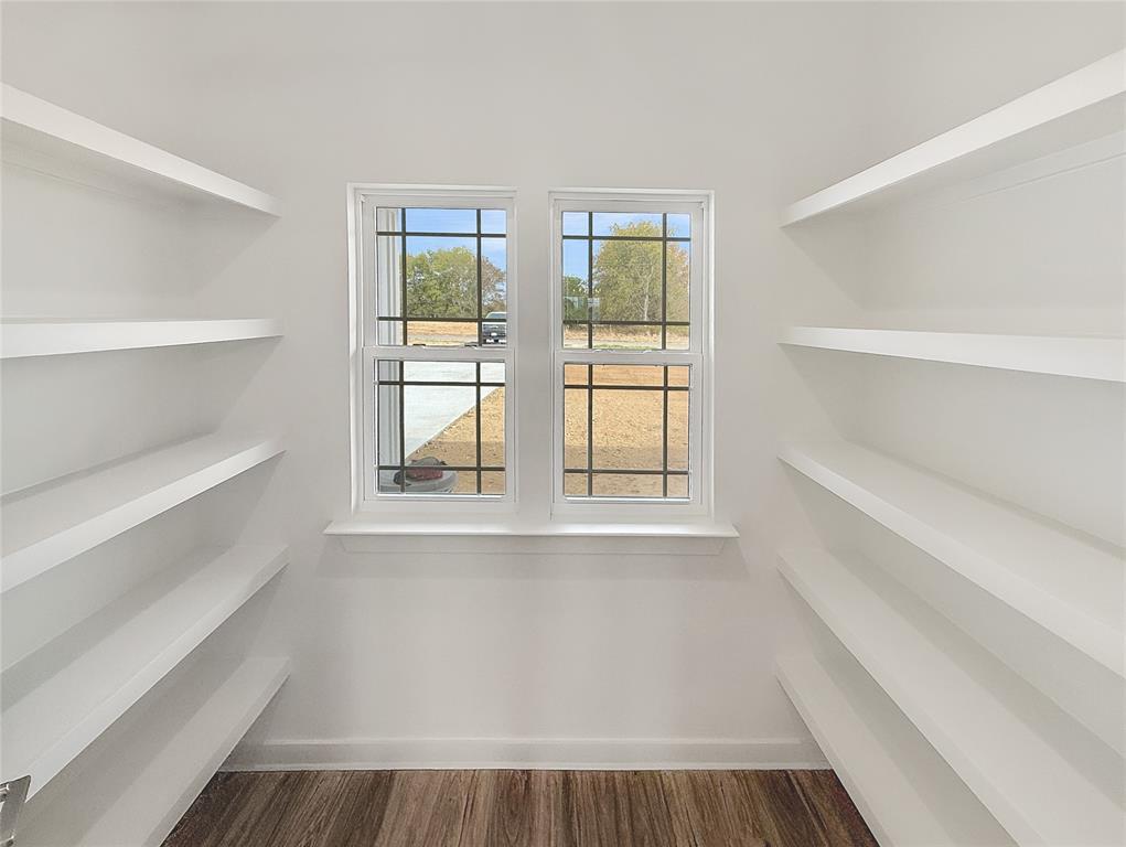 6472 Old Clarksville Road Reno, TX 75462 - Photo 7 of 22 a view of an empty room with a window
