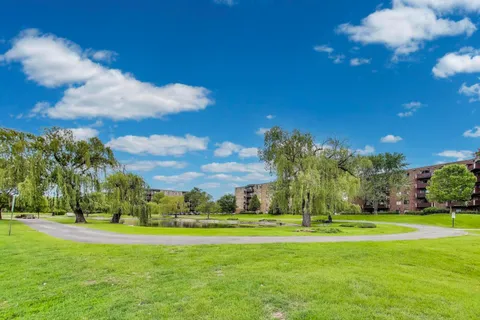 a view of a golf course with a fountain