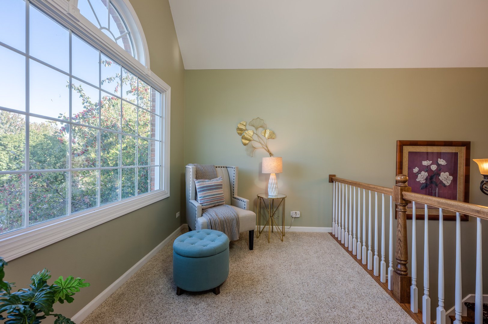 2004 Eldorado Drive Geneva, IL 60134 - Photo 16 of 26 a living room with furniture and a potted plant