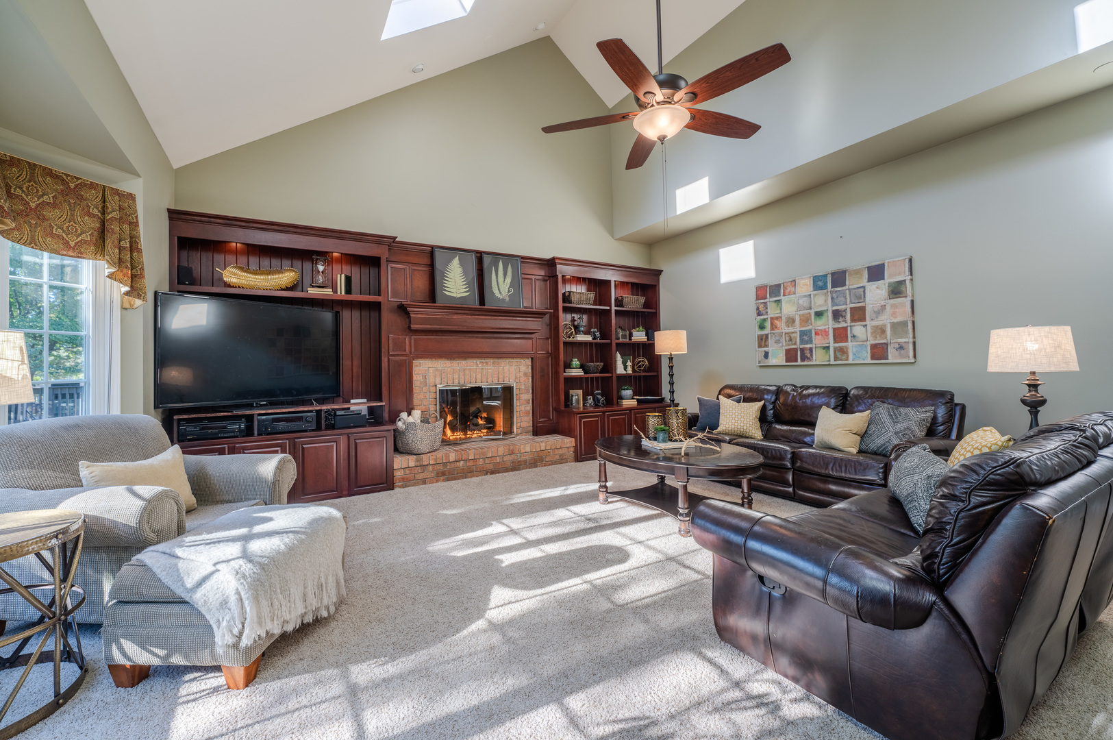2004 Eldorado Drive Geneva, IL 60134 - Photo 9 of 26 a living room with furniture and a flat screen tv
