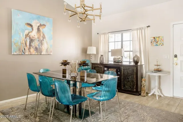 a dining room with furniture and window