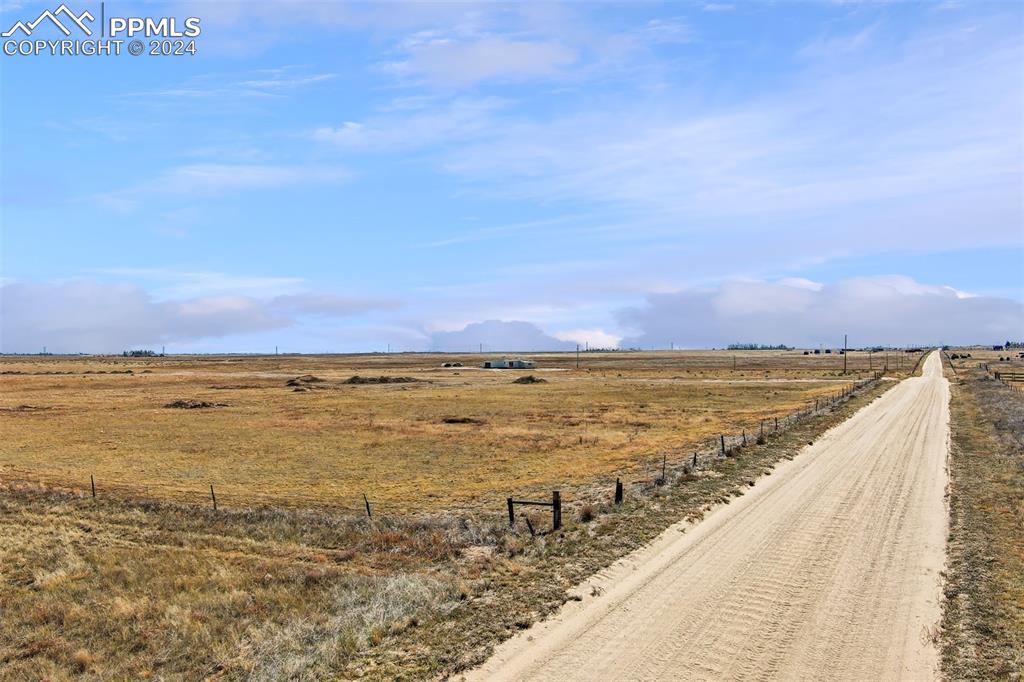9765 Berridge Road Calhan, CO 80808 - Photo 3 of 27 View of street featuring a rural view