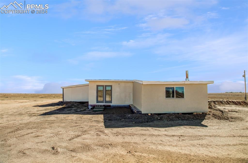 9765 Berridge Road Calhan, CO 80808 - Photo 9 of 27 View of front of house featuring a rural view