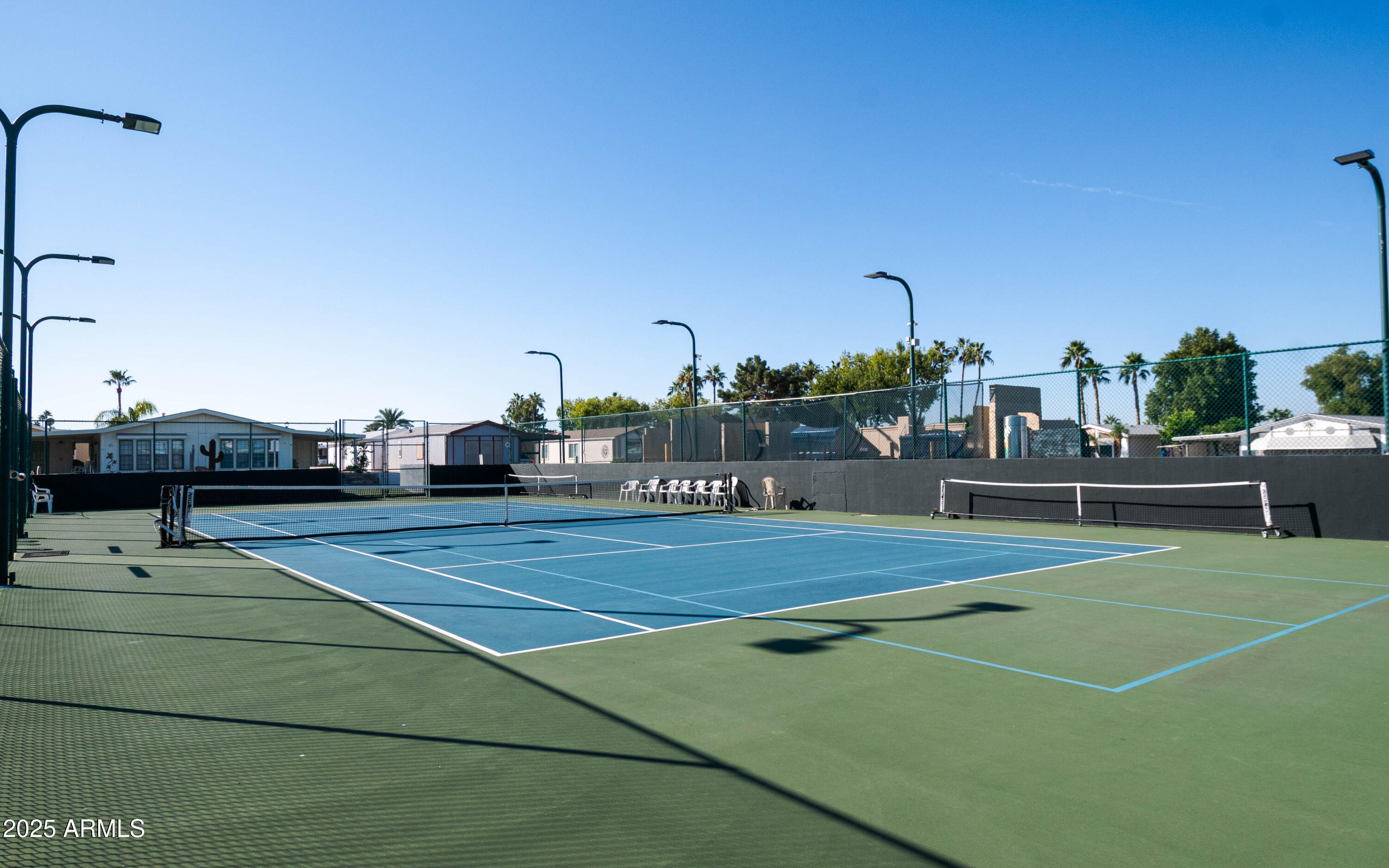 5735 East McDowell Road, Unit 410 Mesa, AZ 85215 - Photo 38 of 45 a view of a tennis court