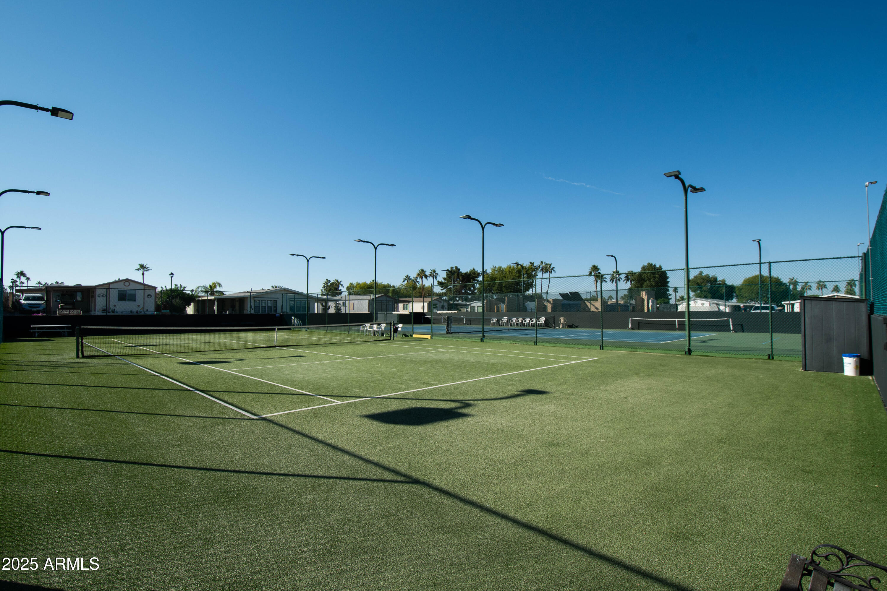 5735 East McDowell Road, Unit 410 Mesa, AZ 85215 - Photo 40 of 45 a view of tennis court