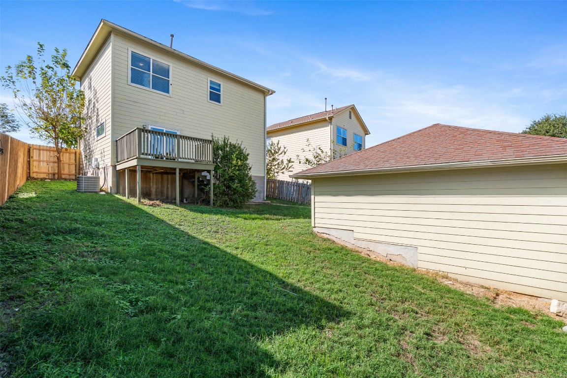 5909 Signal Point Austin, TX 78724 - Photo 21 of 32 a front view of a house with a garden