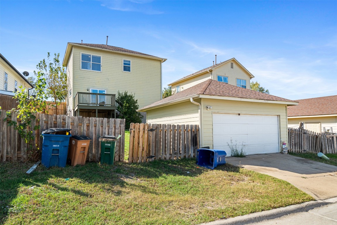 5909 Signal Point Austin, TX 78724 - Photo 23 of 32 a view of a house with a yard and potted plants