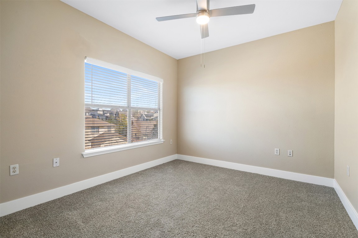 5909 Signal Point Austin, TX 78724 - Photo 24 of 32 an empty room with a window