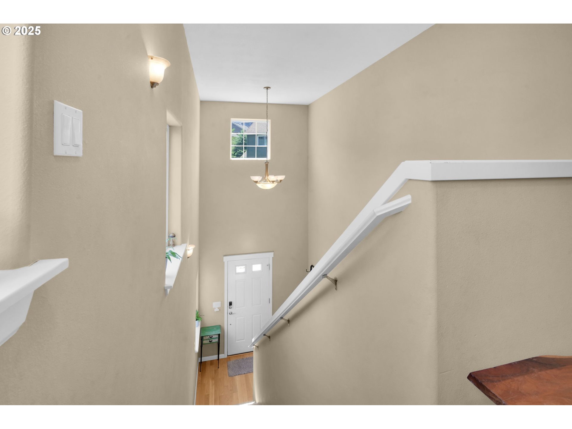 2470 Fieldcress Road Eugene, OR 97403 - Photo 17 of 36 a view of an entryway with wooden floor