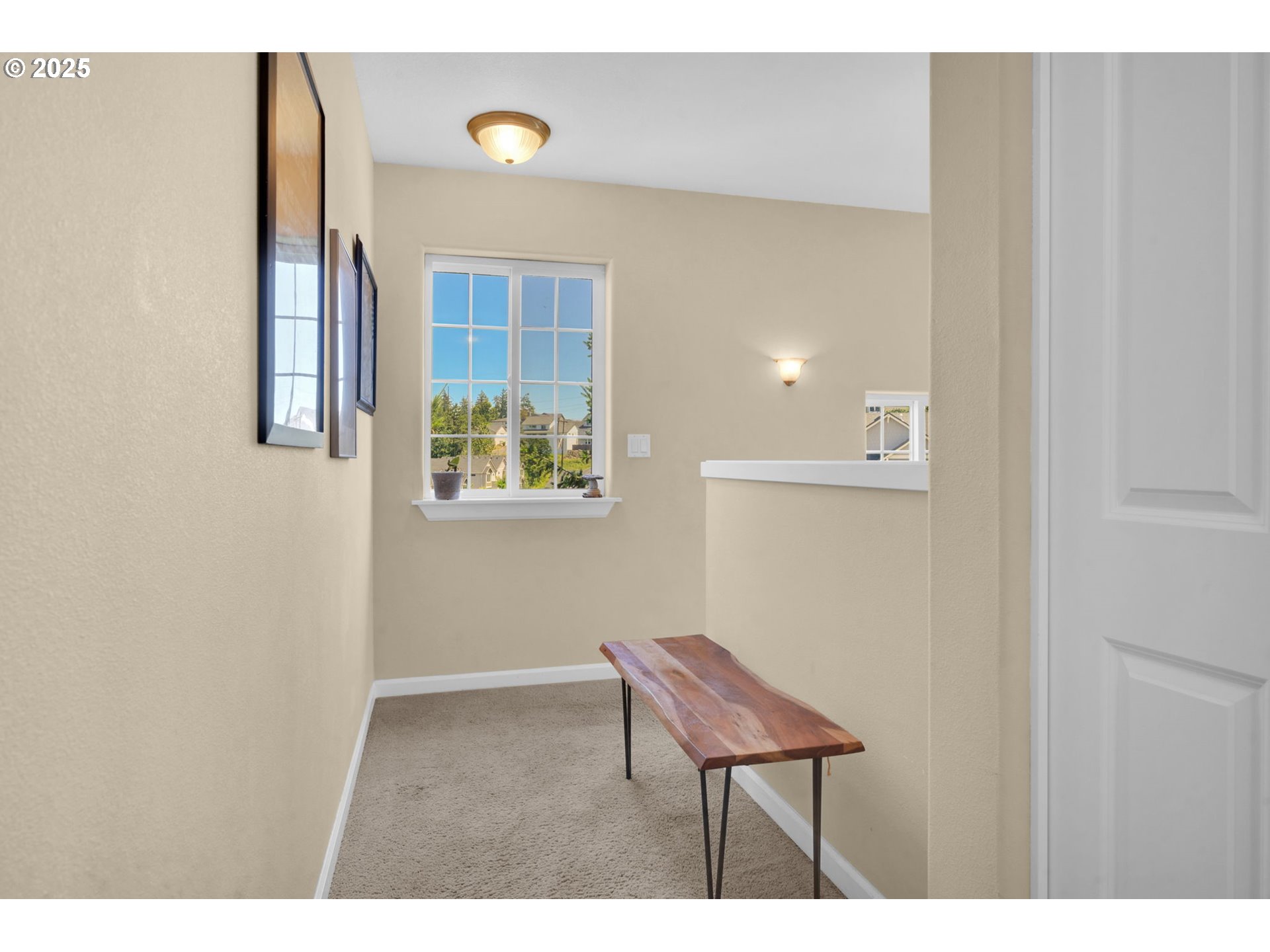 2470 Fieldcress Road Eugene, OR 97403 - Photo 20 of 36 a view of a hallway with seating area