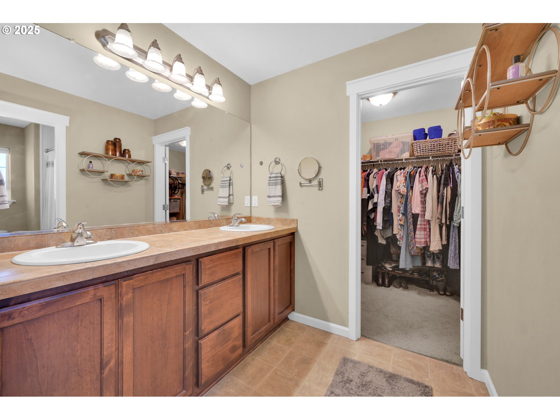 2470 Fieldcress Road Eugene, OR 97403 - Photo 24 of 36 a bathroom with a sink vanity and a mirror