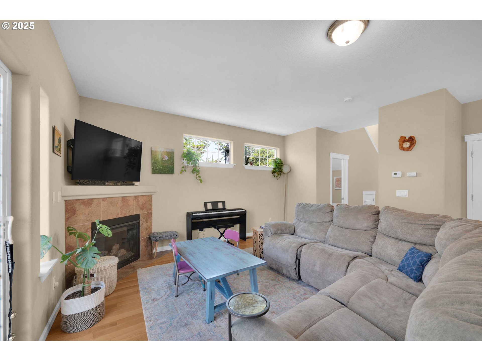 2470 Fieldcress Road Eugene, OR 97403 - Photo 6 of 36 a living room with furniture and a flat screen tv