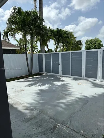 a view of a backyard of the house