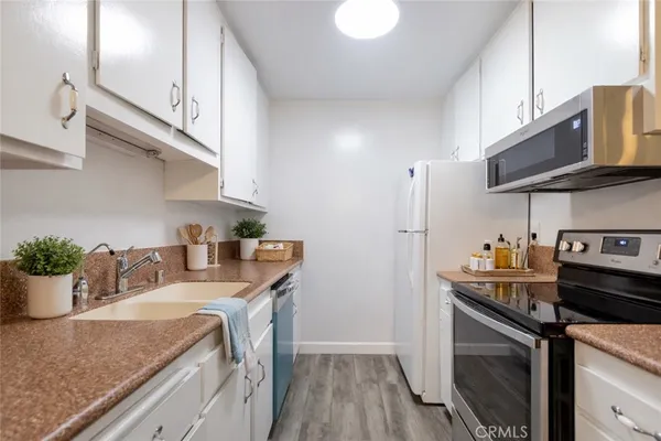 $585,000 | 564 North Bellflower Boulevard, Unit 109, Long Beach, CA 90814