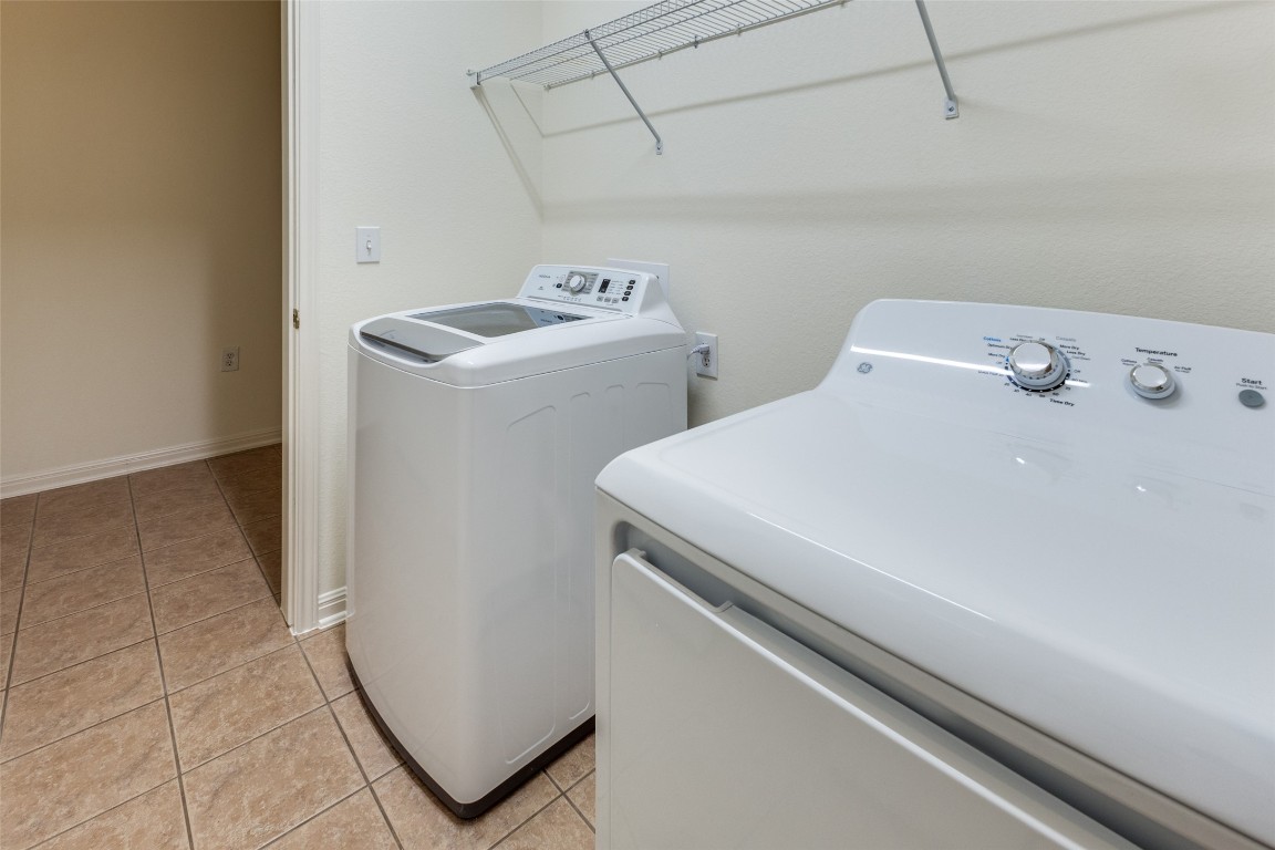 106 Prospector Pass Georgetown, TX 78633 - Photo 11 of 14 a utility room with dryer and washer