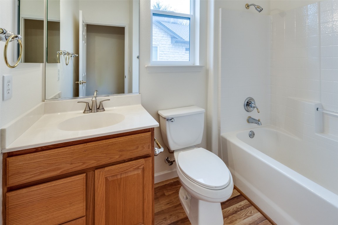106 Prospector Pass Georgetown, TX 78633 - Photo 10 of 14 a bathroom with a sink toilet and shower