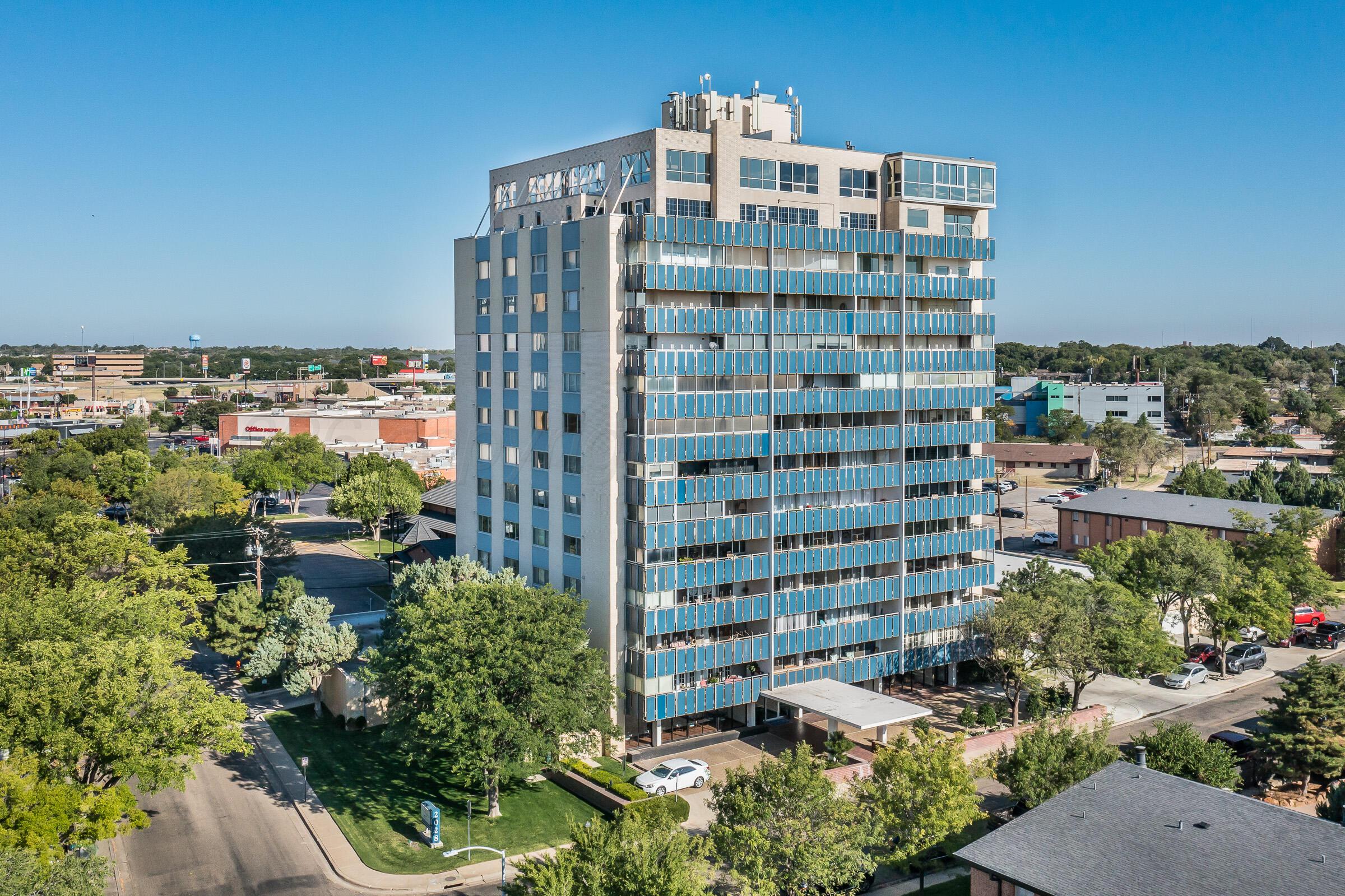 a view of a city with tall buildings