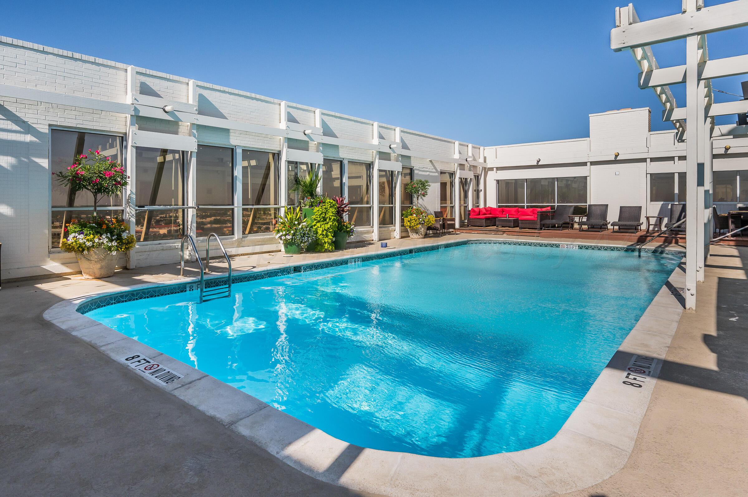 2028 South Austin Street, Unit 902 Amarillo, TX 79109 - Photo 17 of 23 a view of a house with roof deck