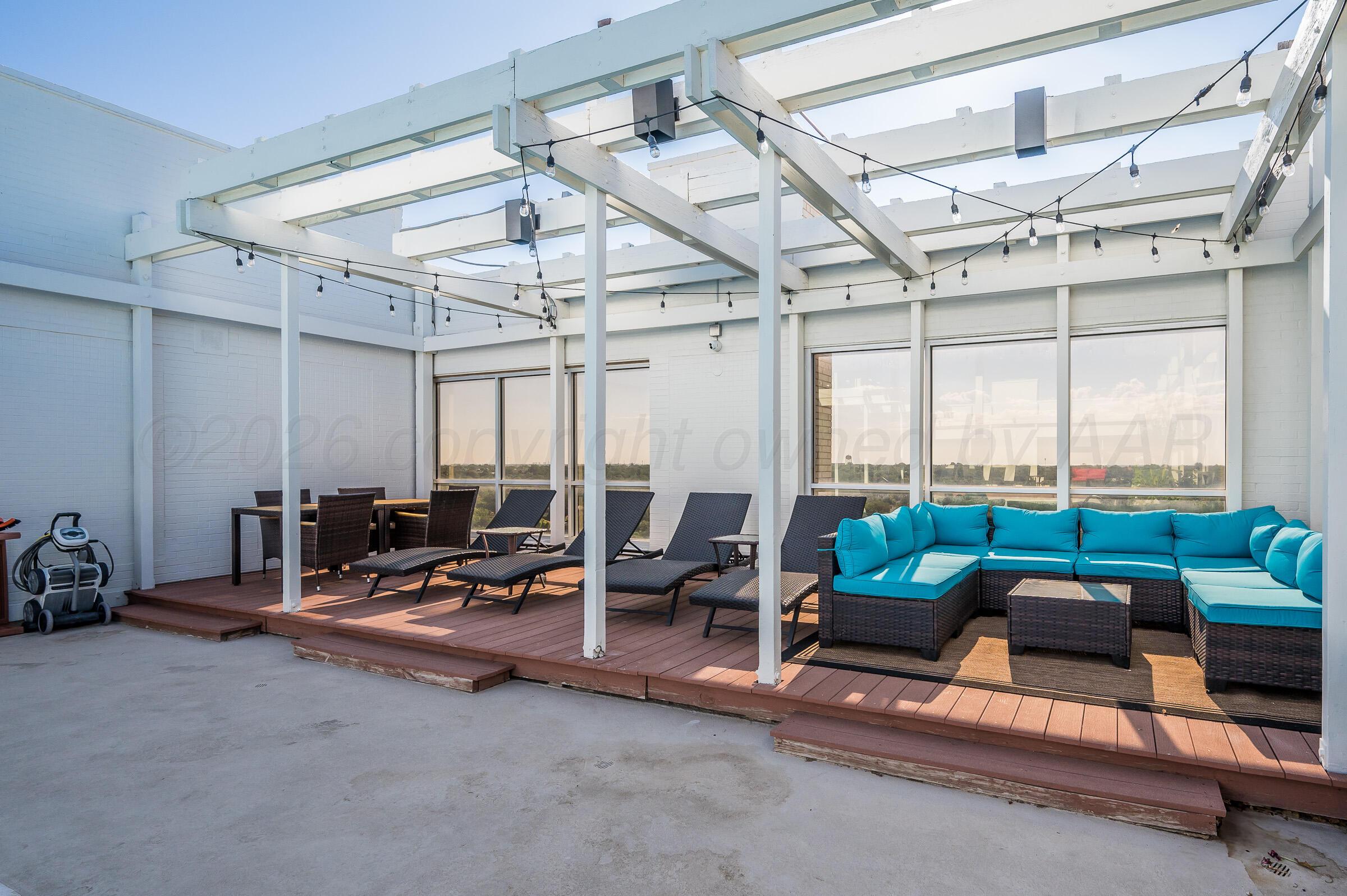 2028 South Austin Street, Unit 902 Amarillo, TX 79109 - Photo 18 of 23 a living room with patio area