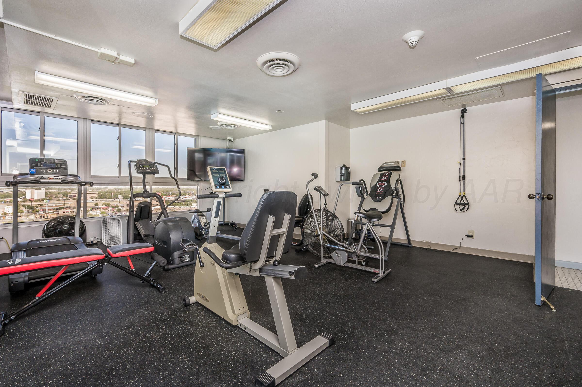 2028 South Austin Street, Unit 902 Amarillo, TX 79109 - Photo 19 of 23 a view of a room with gym equipment