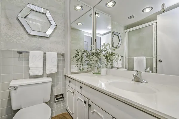 a view of a room with window and cabinet