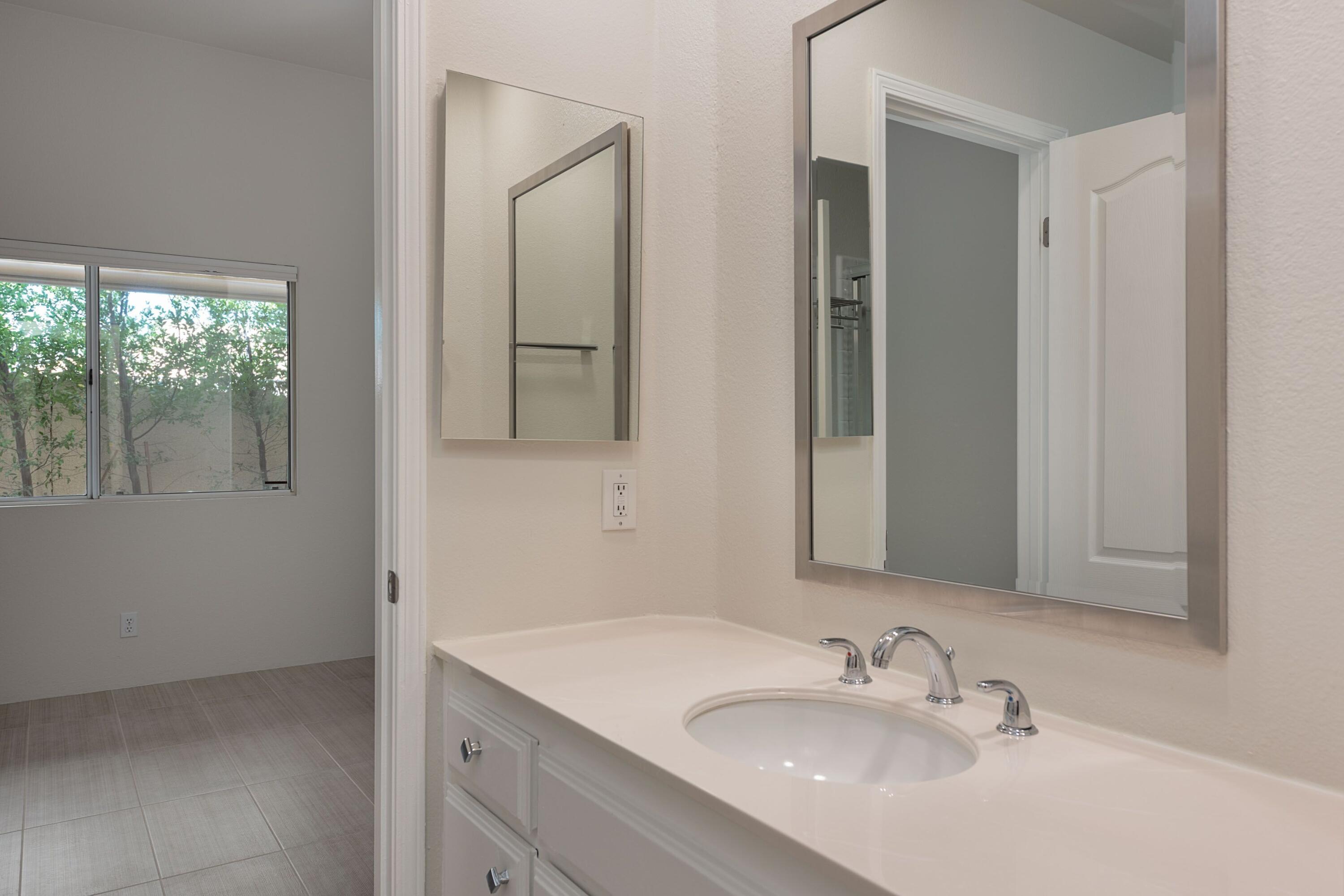 70 Pine Valley Drive Rancho Mirage, CA 92270 - Photo 15 of 31 a bathroom with a sink and a mirror