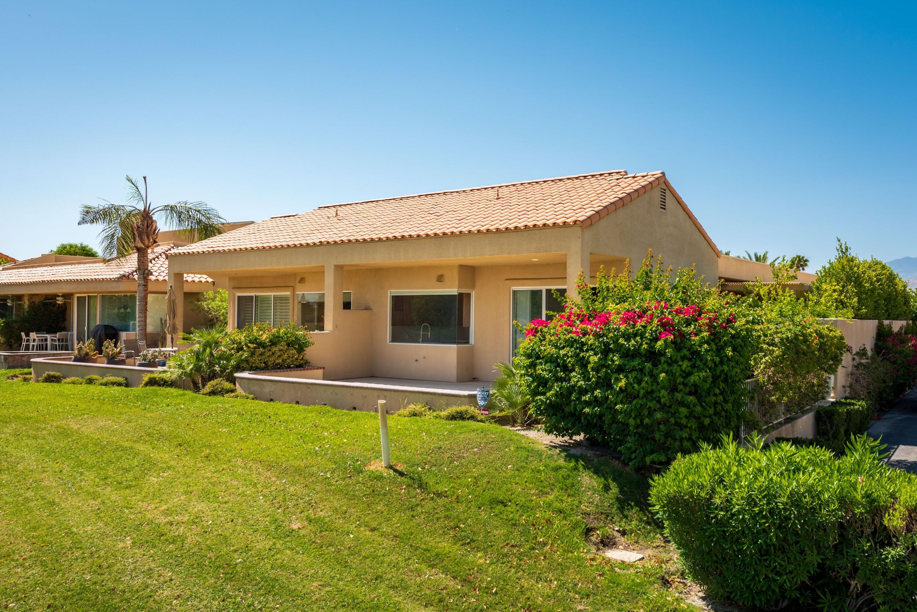 70 Pine Valley Drive Rancho Mirage, CA 92270 - Photo 21 of 31 a front view of a house with patio