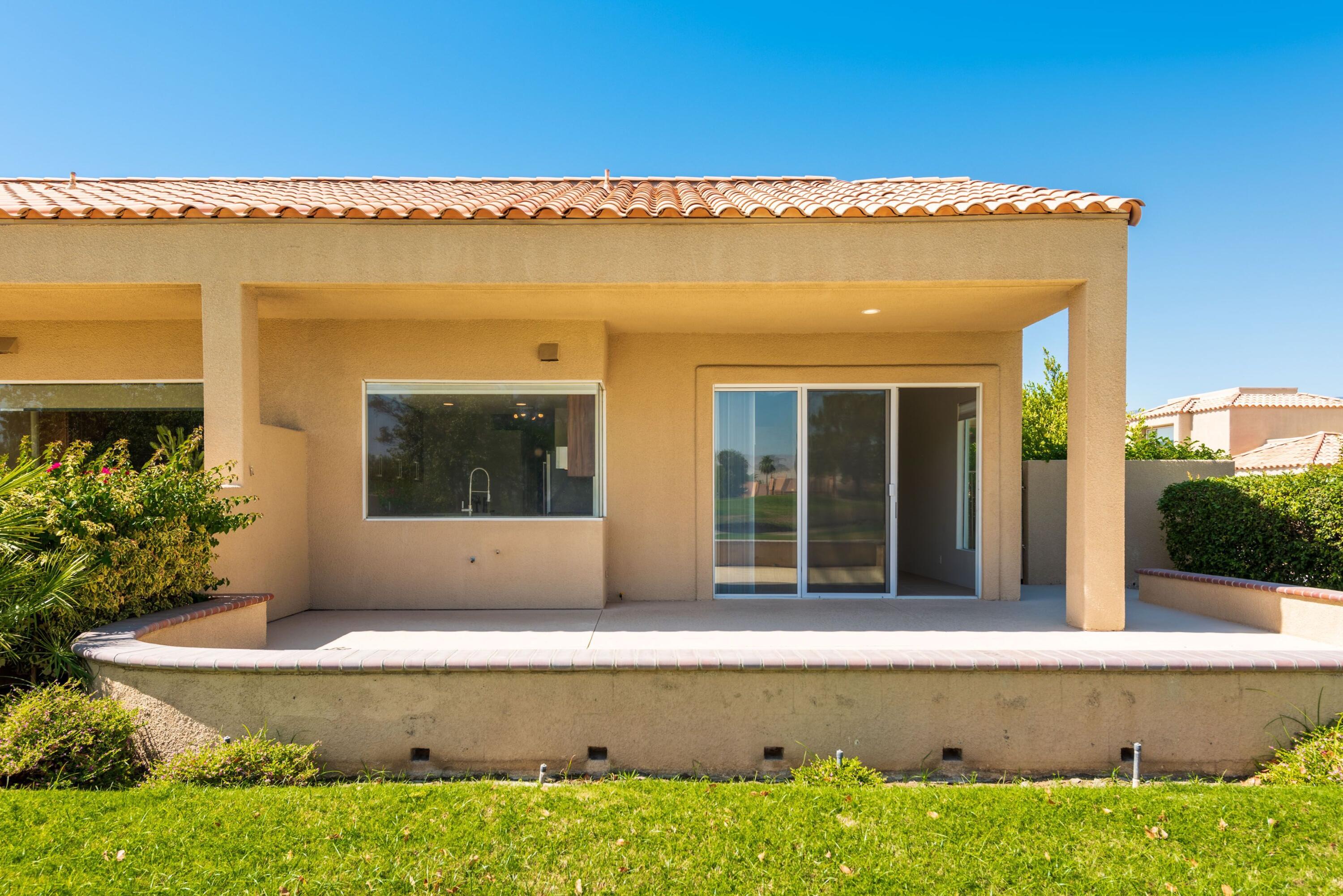 70 Pine Valley Drive Rancho Mirage, CA 92270 - Photo 22 of 31 a front view of house with yard
