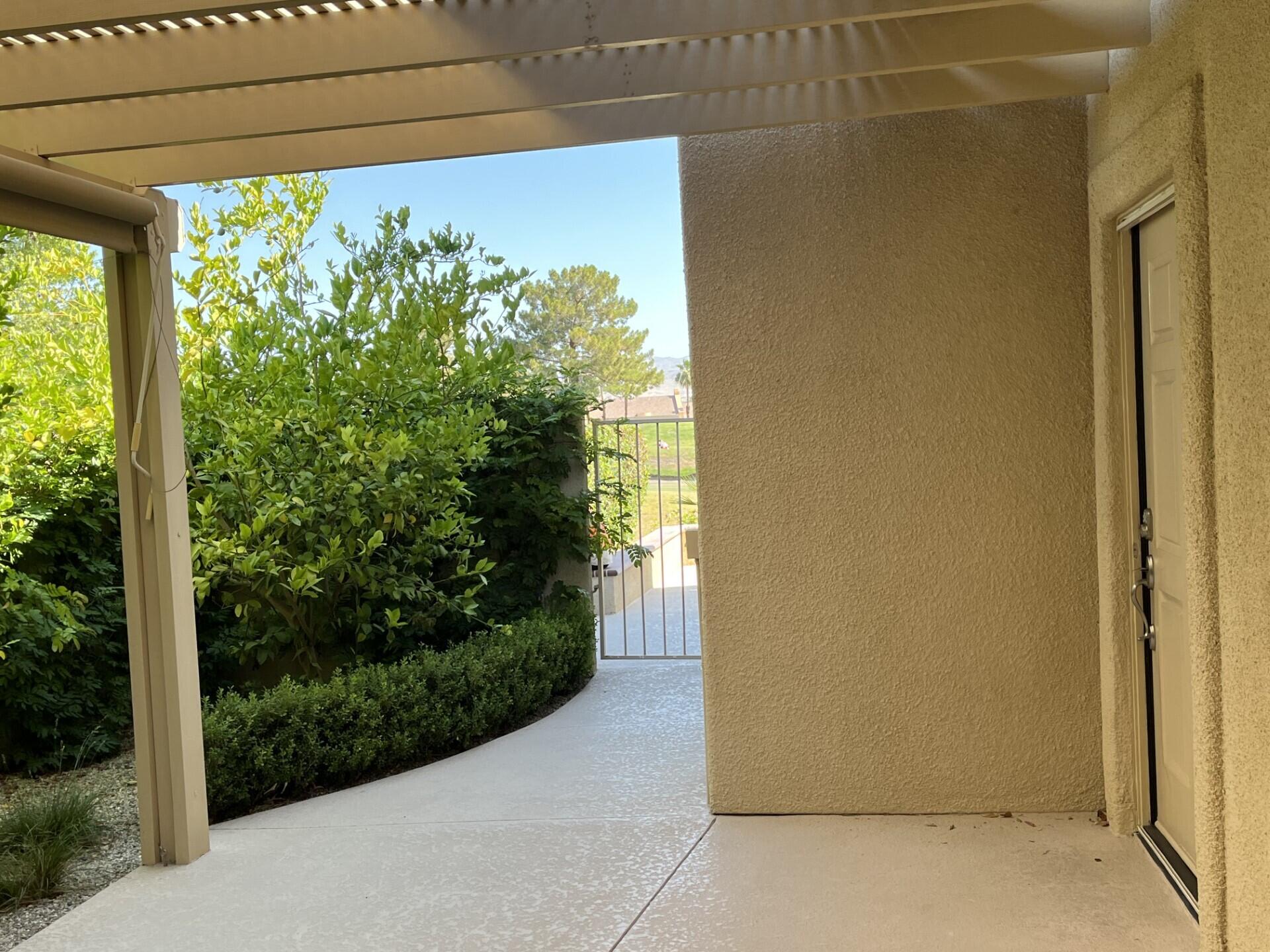 70 Pine Valley Drive Rancho Mirage, CA 92270 - Photo 28 of 31 a view of a porch