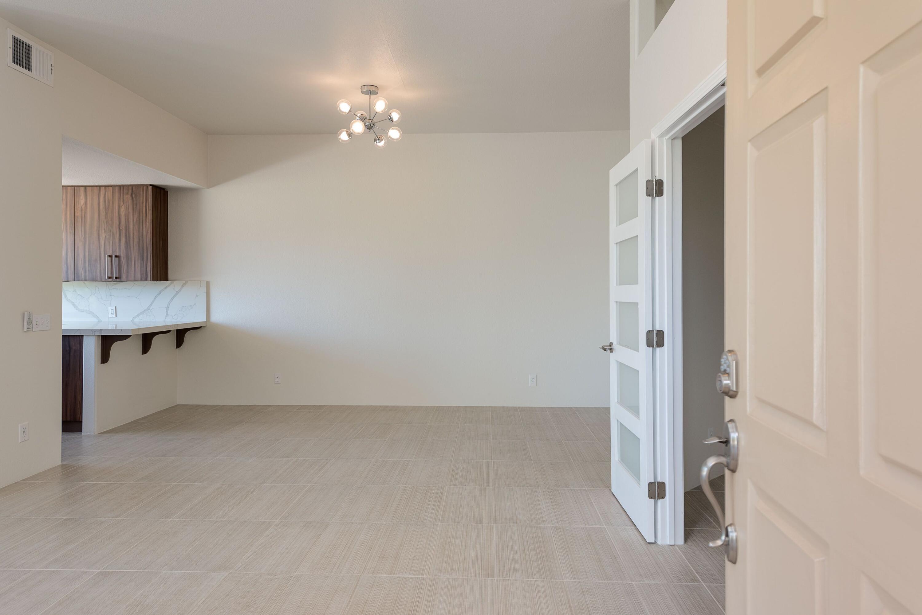 70 Pine Valley Drive Rancho Mirage, CA 92270 - Photo 5 of 31 a view of a room with a hanging light and closet