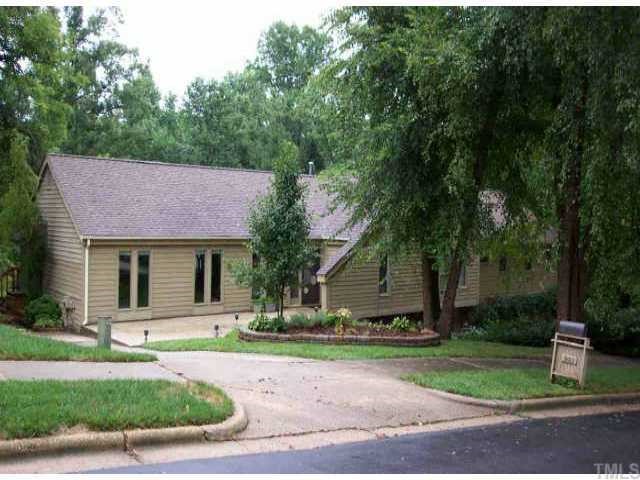 2823 Sania Drive Raleigh, NC 27607 - Photo 1 of 1 a front view of a house with a yard and garage