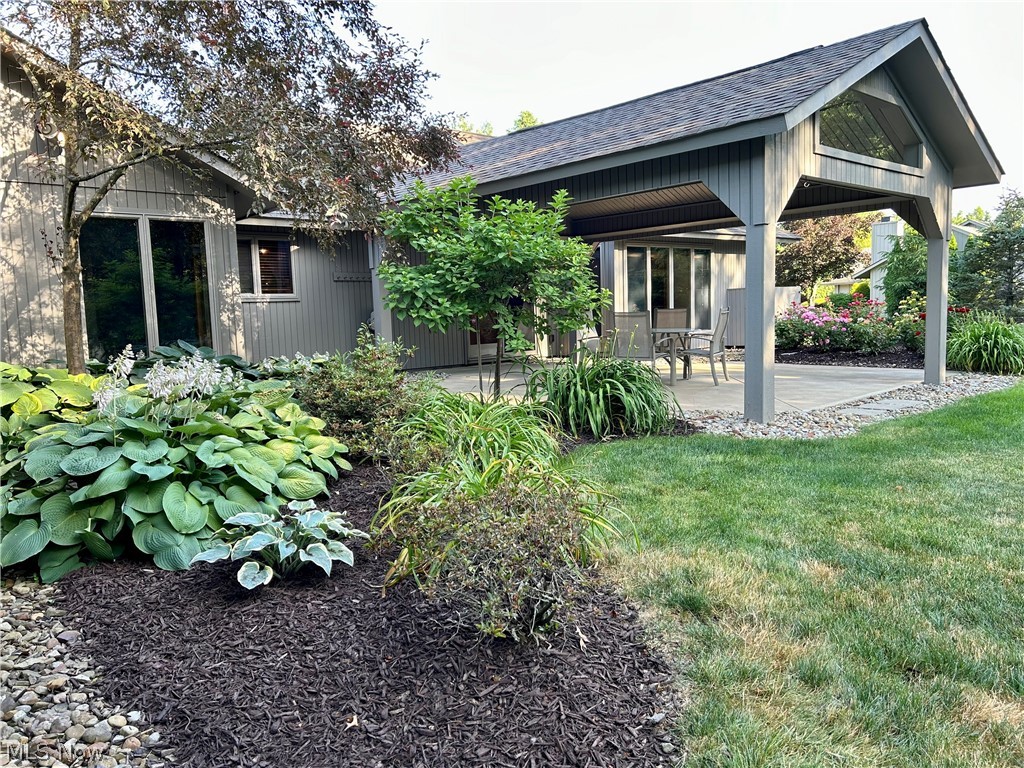 8763 Timber Edge Drive North Ridgeville, OH 44039 - Photo 35 of 40 View of yard featuring a patio