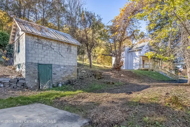 a backyard of a house with lots of green space