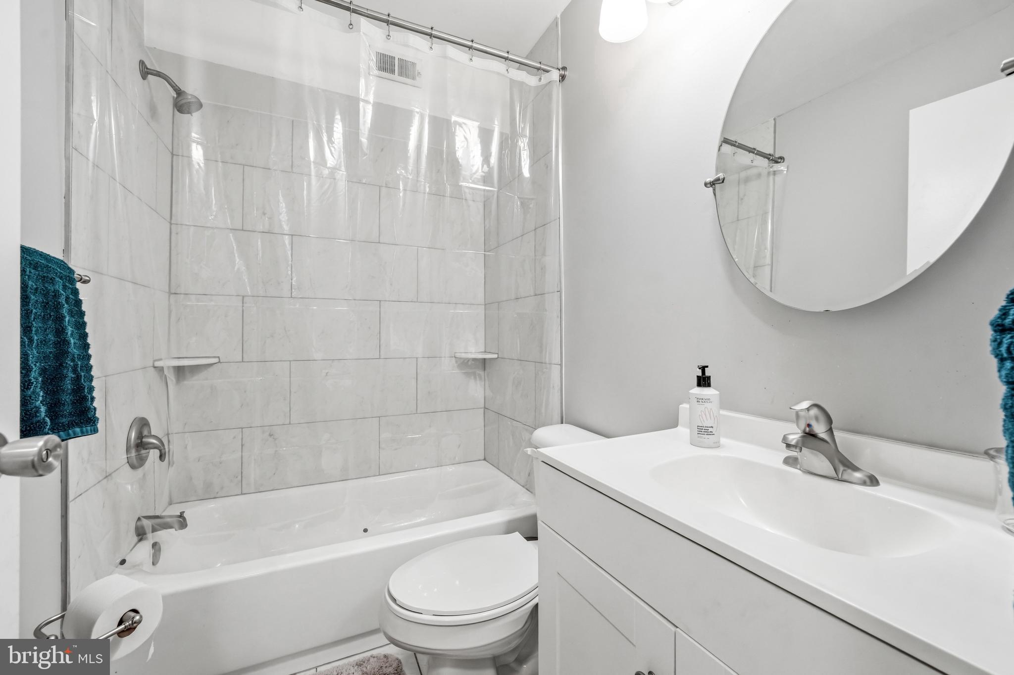 2705A Heatherstone Court Mount Laurel, NJ 08054 - Photo 16 of 29 a bathroom with a sink a toilet and a bathtub