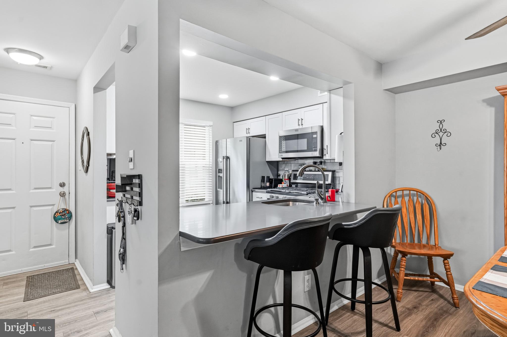 2705A Heatherstone Court Mount Laurel, NJ 08054 - Photo 9 of 29 a dining room with furniture and window