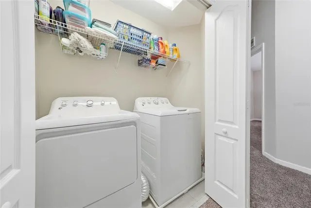 a bedroom with a bed and a desk